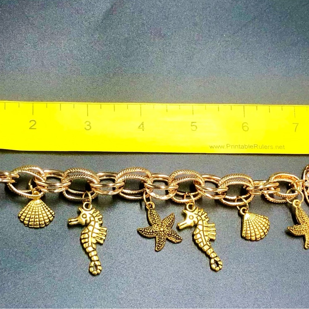 Gold Nautical Charm Bracelet with Seashell and Starfish